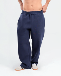 Male model wearing Navy Baggy Sweatpants