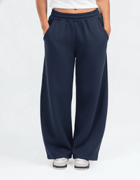 Female model wearing Navy Wide Leg Sweatpants